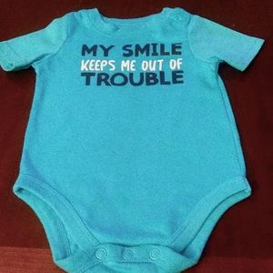 3 to 6mth My Smile Keeps Me Out Of Trouble onesie